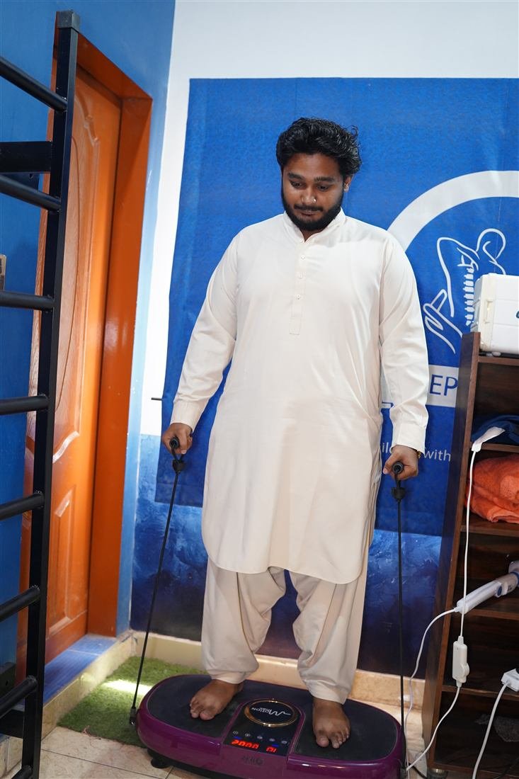 Patient using a vibration therapy platform