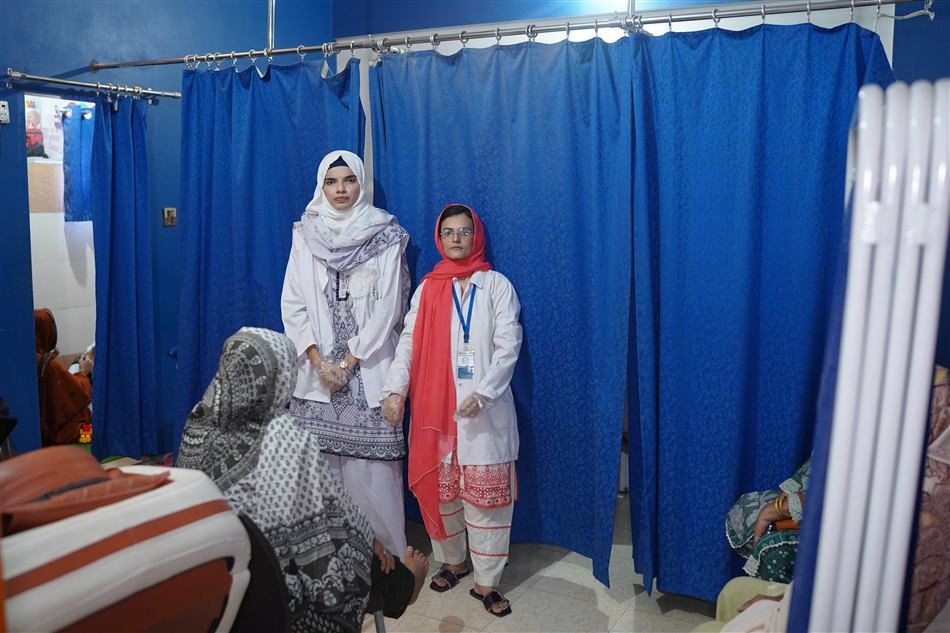 Two staff members on the therapy floor